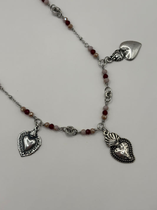Collana TreCuori in acciaio con cuori sacri e cristalli